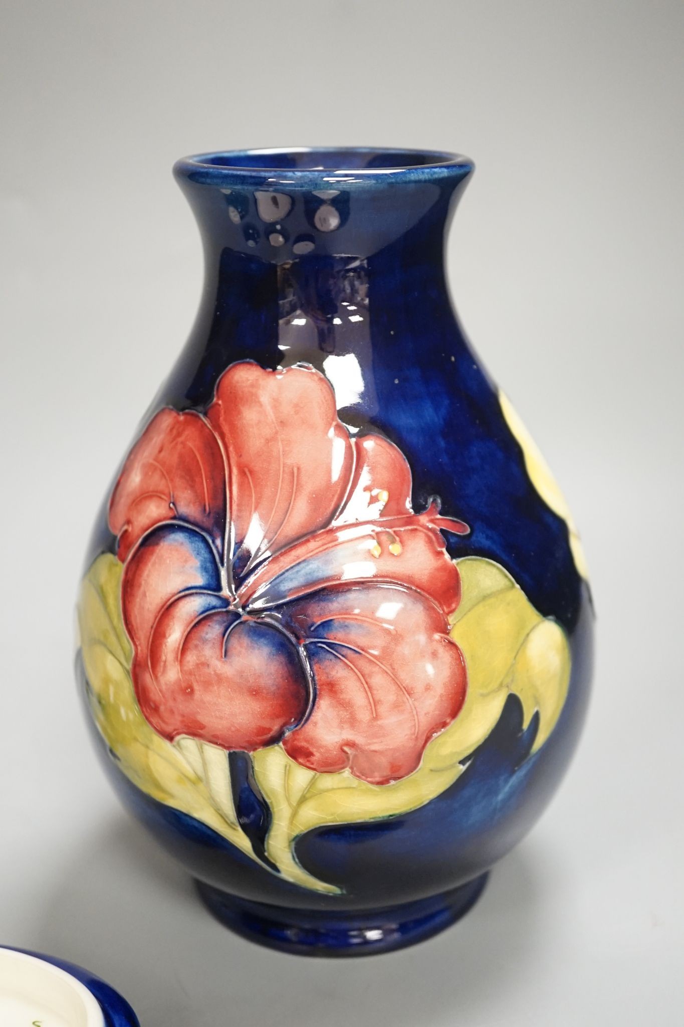 A Moorcroft vase, a similar box, 2 dishes and 2 bowls, Vase 29 cms high.